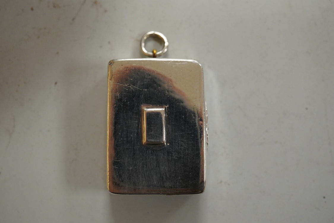 A William IV silver rectangular vinaigrette, by Nathaniel Mills, Birmingham 1830, 30mm(tired), together with a William IV silver pap boat, London, 1832, with later added hallmarked Victorian handle.